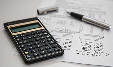 Calculator with financial numbers.